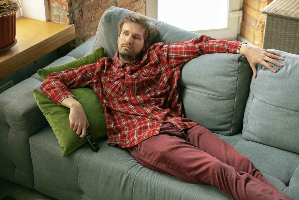 A man on sofa at home