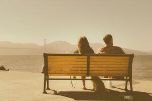 Couple sitting on bench