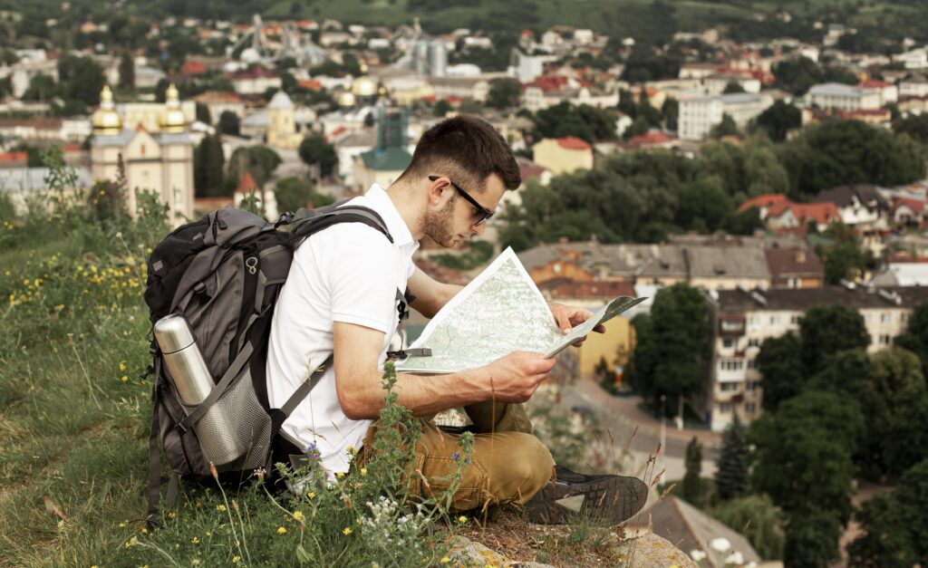 A backpacker with a map